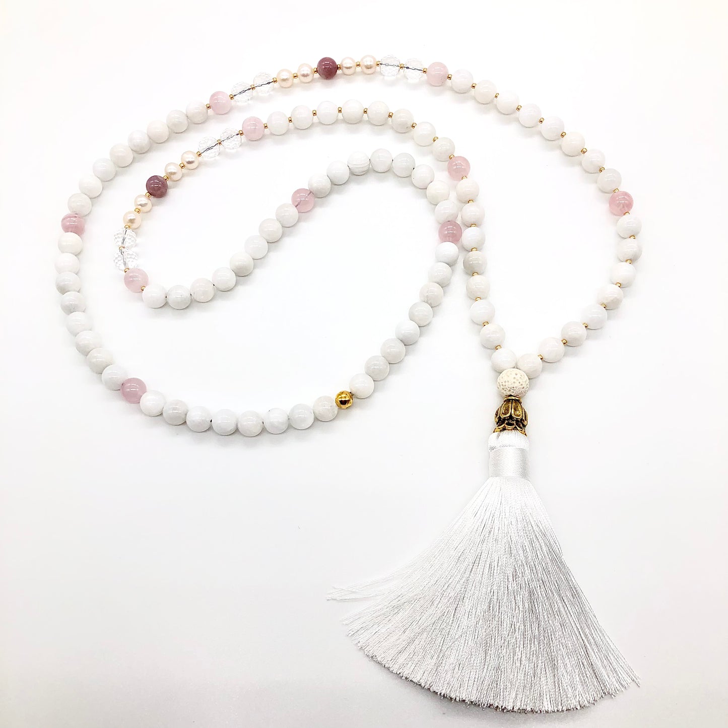 real moonstone necklace with white tassel and gold cone