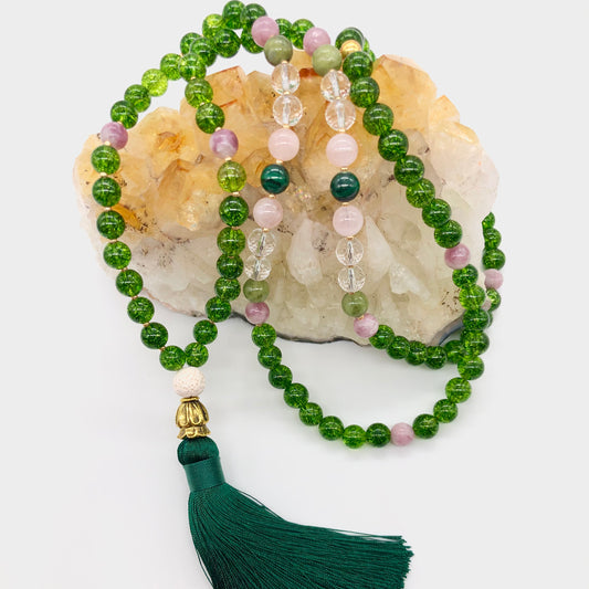 Green Crystal Necklace sits on top of citrine crystal