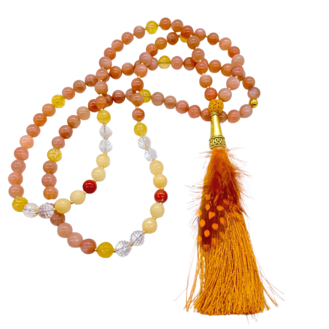 Sunstone necklace with gold cone and orange feather tassel